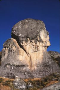 Peca Gasha (translated as the head at the alley) is an imposing rock which in fact is first seen upon ascending by the short route at the end of a narrowing canyon (the “alley”). Daniel Ruzo identified at least fourteen different heads and faces on the Peca Gasha. On this photograph, taken in July 1986, three of these personages can be easily seen. The most important looks south (to the right) with a line of sight of 180 degrees (Table 1). The eye is formed by the light and shadow on the stone near mid-day. Two personages look north, the larger with a prominent curved nose with a crevasse which forms its eye. This nose constitutes the minor character (standing). The line of sight of the Peca Gasha is 180 degrees south (Table 1).